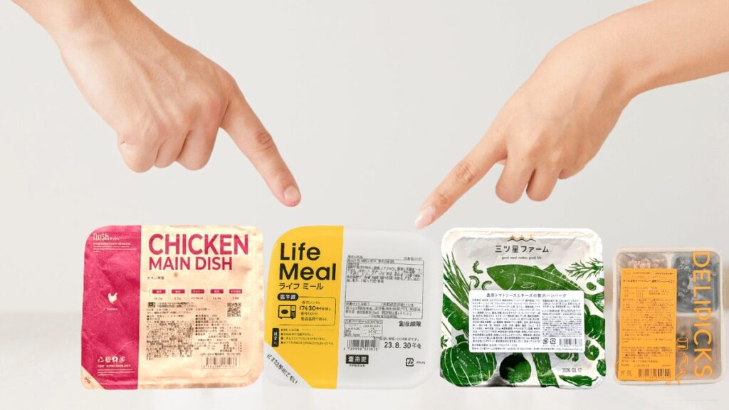 ナッシュ、ライフミール、三ツ星ファーム、デリピックスの冷凍弁当パッケージを並べて比較している写真。各ブランドの容器デザインやサイズ感の違いがわかる。